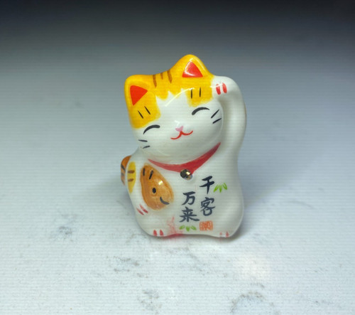 Japanese maneki neko lucky cat - maneki,
